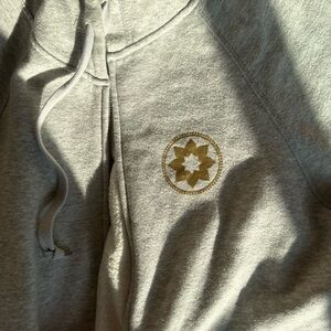 Spiritual Gangster Gray Zip Up Hoodie with Gold Emblem | Peace, Love, Pilates